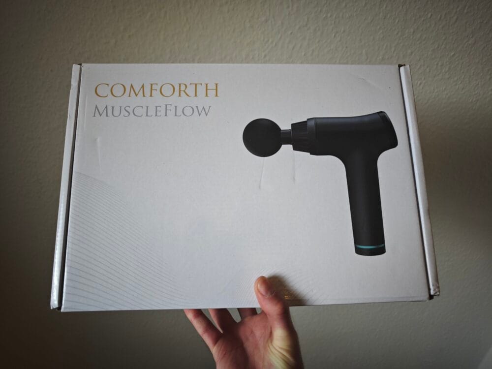 Muscleflow massagepistol i kassen